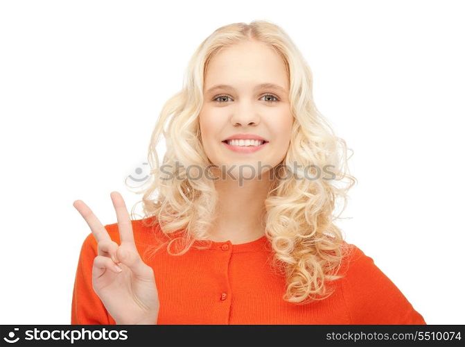 bright picture of lovely teenage girl showing victory sign