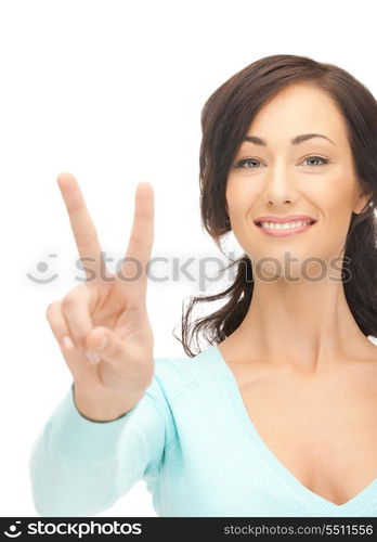 bright picture of lovely teenage girl showing victory sign