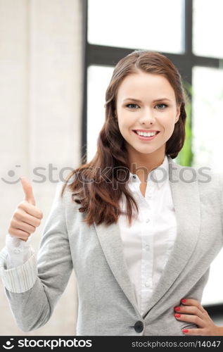 bright picture of lovely teenage girl with thumbs up