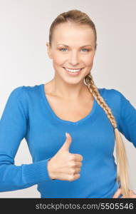 bright picture of lovely teenage girl with thumbs up