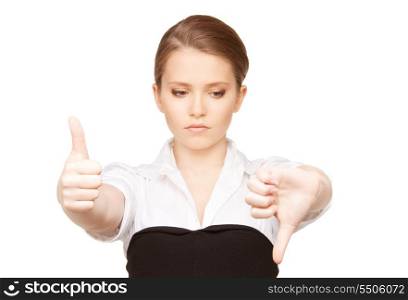 bright picture of lovely teenage girl with thumbs up and thumbs down&#xA;