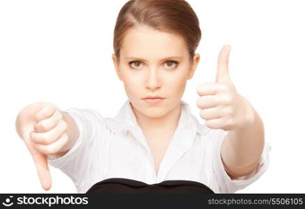 bright picture of lovely teenage girl with thumbs up and thumbs down&#xA;