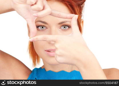 bright picture of lovely woman creating a frame with fingers