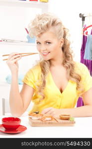 bright picture of lovely woman eating sushi