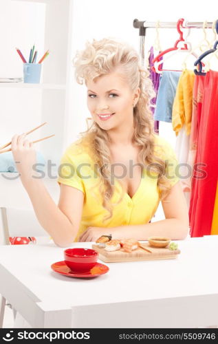 bright picture of lovely woman eating sushi