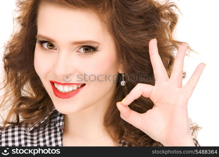 bright picture of lovely woman showing ok sign