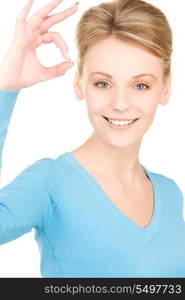 bright picture of lovely woman showing ok sign