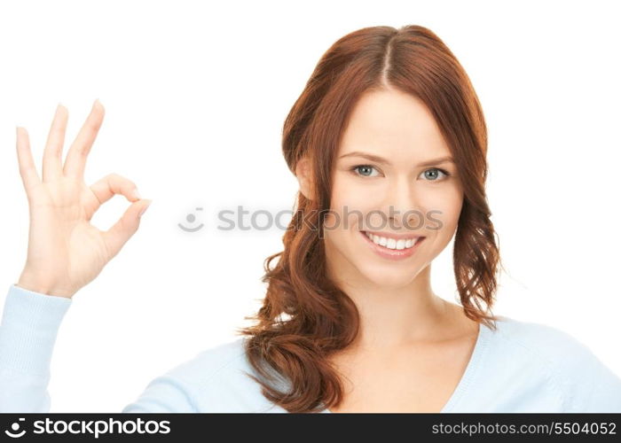 bright picture of lovely woman showing ok sign