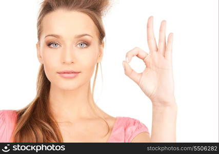 bright picture of lovely woman showing ok sign