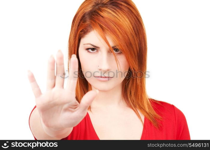 bright picture of lovely woman showing stop sign