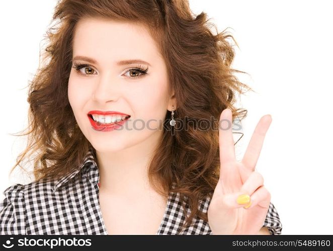 bright picture of lovely woman showing victory sign