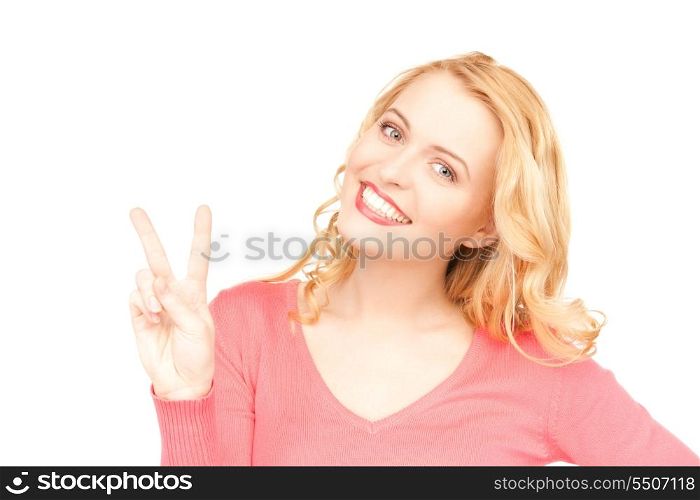 bright picture of lovely woman showing victory sign