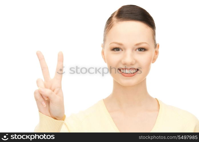 bright picture of lovely woman showing victory sign&#xA;