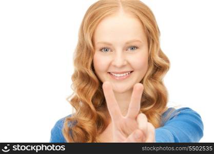 bright picture of lovely woman showing victory sign&#xA;