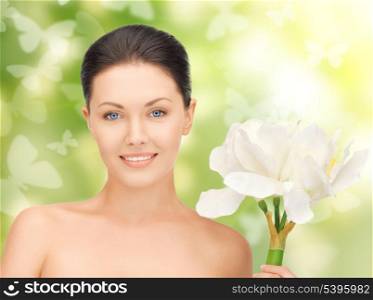 bright picture of lovely woman with lily flower and butterflies
