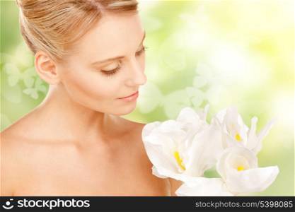 bright picture of lovely woman with lily flower and butterflies