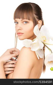 bright picture of lovely woman with orchid flower.