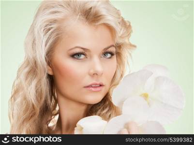 bright picture of lovely woman with orchid flower