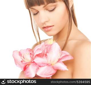 bright picture of lovely woman with red lily flower.