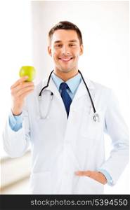 bright picture of male doctor with green apple