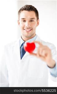 bright picture of male doctor with heart