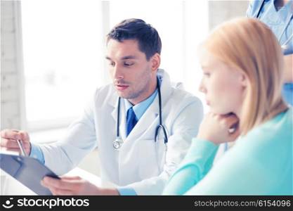 bright picture of male doctor with patient. male doctor with patient