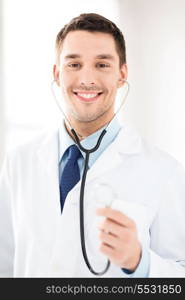 bright picture of male doctor with stethoscope