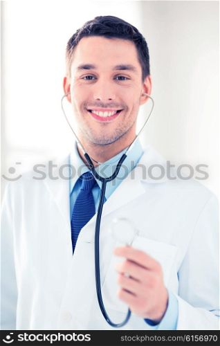 bright picture of male doctor with stethoscope. male doctor with stethoscope