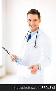 bright picture of male doctor writing prescription