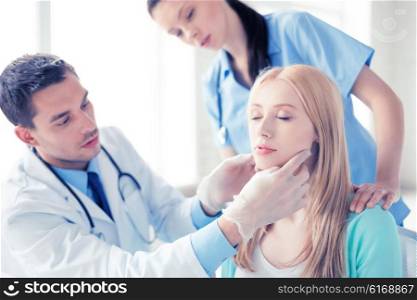 bright picture of male plastic surgeon with patient. male plastic surgeon with patient