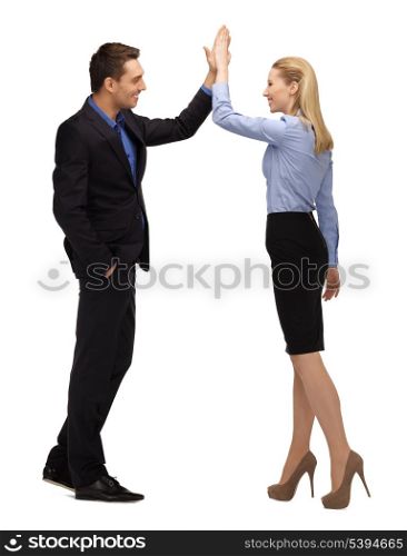 bright picture of man and woman giving a high five.