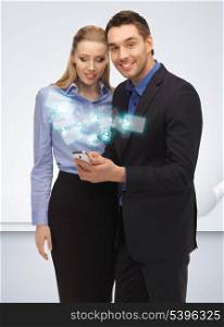 bright picture of man and woman with smartphone