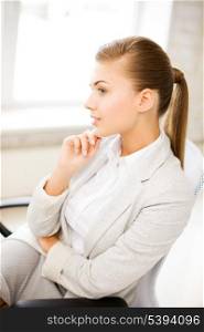 bright picture of pensive woman in office