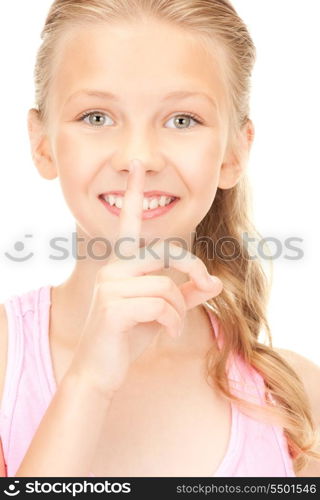 bright picture of pretty girl with finger on lips&#xA;