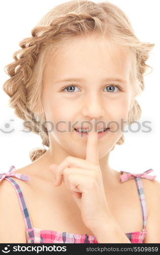 bright picture of pretty girl with finger on lips&#xA;