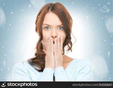 bright picture of pretty woman with hands over mouth.