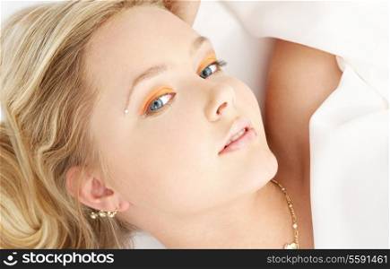 bright picture of relaxed blue-eyed blond girl