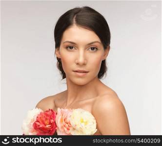 bright picture of relaxed woman with flowers.