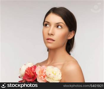 bright picture of relaxed woman with flowers.