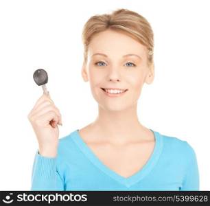 bright picture of smiling woman with car key