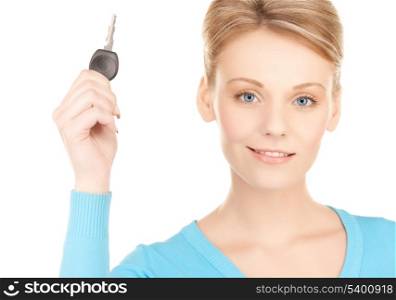 bright picture of smiling woman with car key