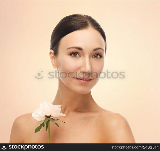 bright picture of smiling woman with rose