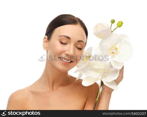 bright picture of smiling woman with white orchid flower.