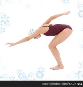 bright picture of swimmer woman with snowflakes