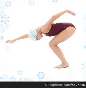 bright picture of swimmer woman with snowflakes