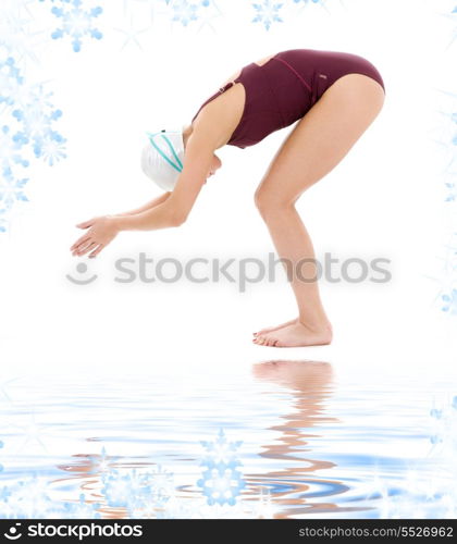 bright picture of swimmer woman with snowflakes