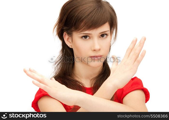 bright picture of teenage girl making stop gesture