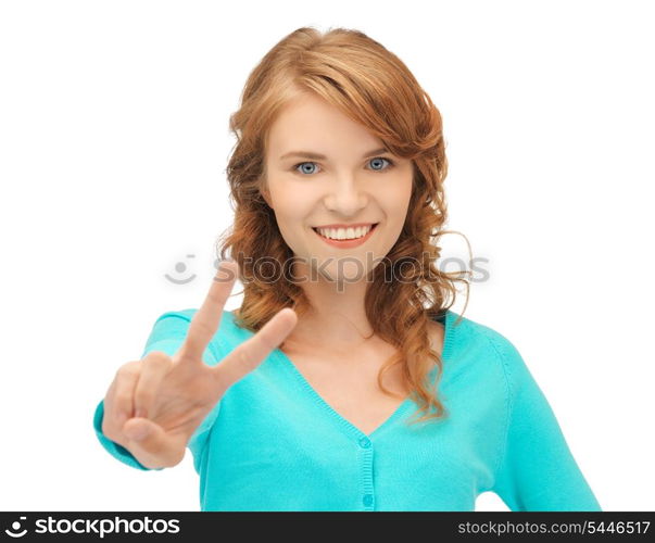 bright picture of teenage girl showing victory sign