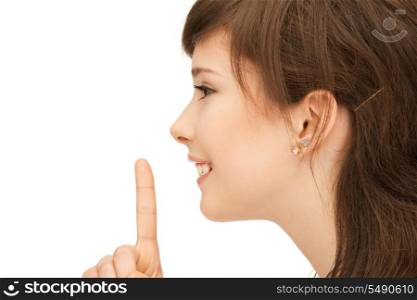 bright picture of teenage girl with finger on lips