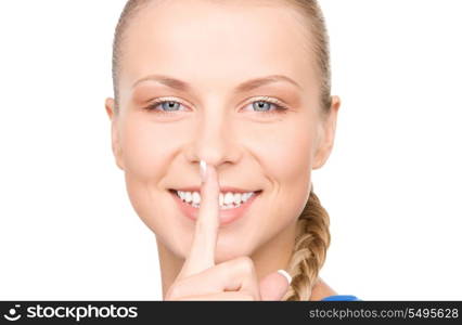 bright picture of teenage girl with finger on lips